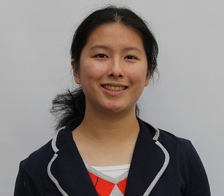 Picture of Joyce Zhu looking very professional